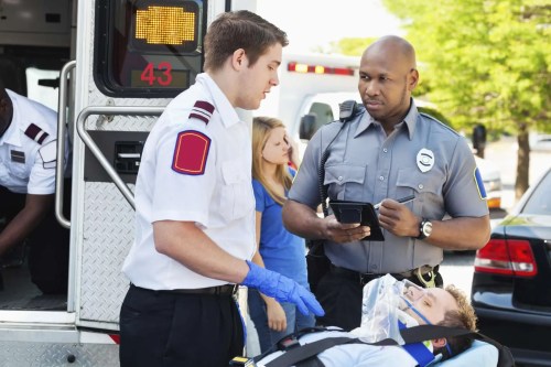 EMT assessing a patient